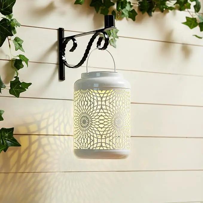 Glitzhome Solar Lantern White Metal Cutout Scrollwork Outdoor Hanging Solar Light with Handle for Garden Patio Yard Outdoor Decor by GreenHaven Gardens