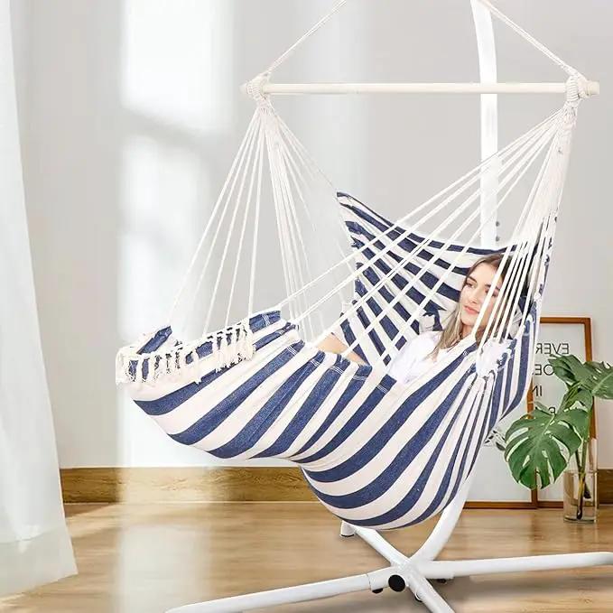 Chihee Hammock Chair Hanging Chair with Foot Rest 2 Cushions Max 500lbs Robust Metal Spreader Bar Collapsible Easy Storage Soft Cotton Swing Chair Strong Strap Iron Carabiner Side Pocket Included by GreenHaven Gardens