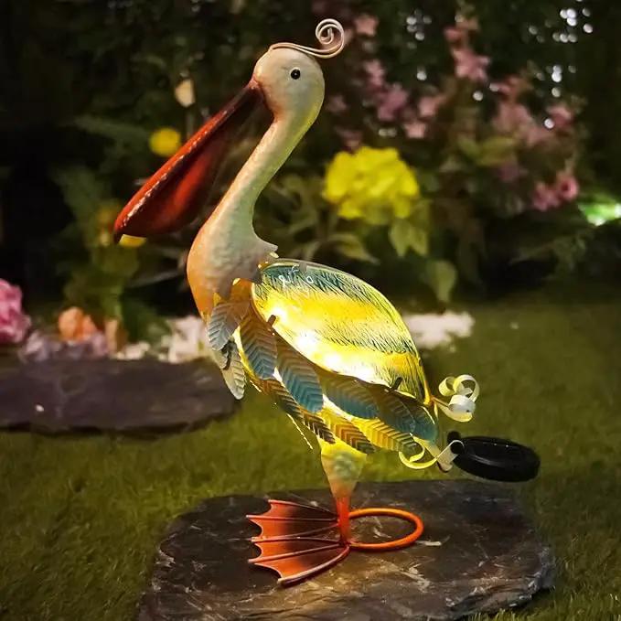 HONGLAND Solar Metal Pelican Statues Garden Sculpture & Statues, Glass Outdoor Pelican Yard Art Coastal Ocean Bird Decor Lawn Ornament for Backyard Porch Patio Decor（19 Inch） by GreenHaven Gardens