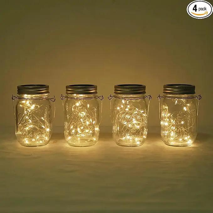 Decorman Solar Mason Jar Lights, 4 Pack 30 LED Fairy Star Firefly String Lids Lights with 4 Hangers for Patio Yard Garden Party Wedding Christmas Decoration(Jars Not Included) (4 Pack, Warm White) by GreenHaven Gardens