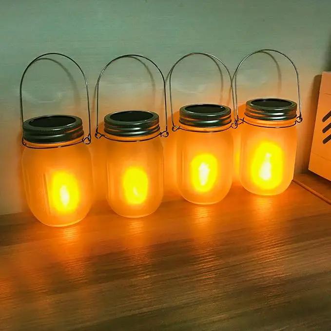 Solar Mason Jar Flicker Lights Upgraded, 4 Pack Flickering Torches Lights Outdoor Hanging Lanterns Landscape Decoration Lighting Dusk to Dawn Auto On/Off Security Halloween Torch Lights by GreenHaven Gardens