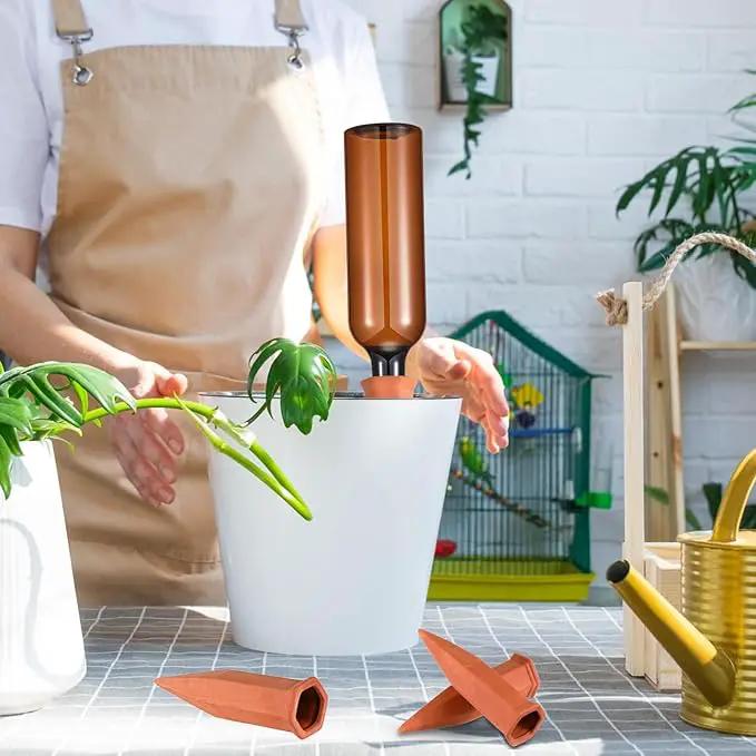 Baderke 12 Set Plant Watering Devices, Terracotta Watering Spikes with 25 oz Plastic Wine Bottles, Slow Release Vacation Insert Automatic Plant Waterer Device for Indoor Outdoor by GreenHaven Gardens