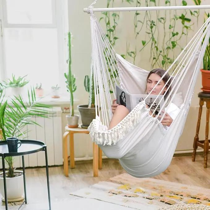 Chihee Hammock Chair Hanging Chair with Foot Rest 2 Cushions Max 500lbs Robust Metal Spreader Bar Collapsible Easy Storage Soft Cotton Swing Chair Strong Strap Iron Carabiner Side Pocket Included by GreenHaven Gardens