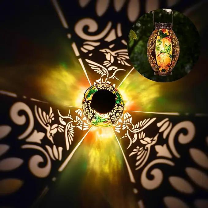 Hanging Solar Lantern Outdoor Waterproof Glass Solar Hummingbird Flickering Flame LED Garden Lights Metal Hollowed-Out Table Lamps Garden Decorations for Yard Patio Pathway Tabletop Tree Holiday by GreenHaven Gardens