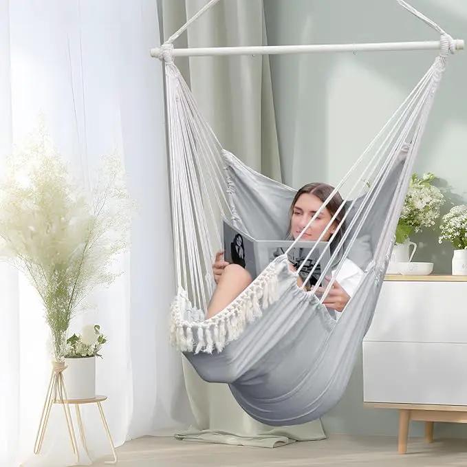Chihee Hammock Chair Hanging Chair with Foot Rest 2 Cushions Max 500lbs Robust Metal Spreader Bar Collapsible Easy Storage Soft Cotton Swing Chair Strong Strap Iron Carabiner Side Pocket Included by GreenHaven Gardens