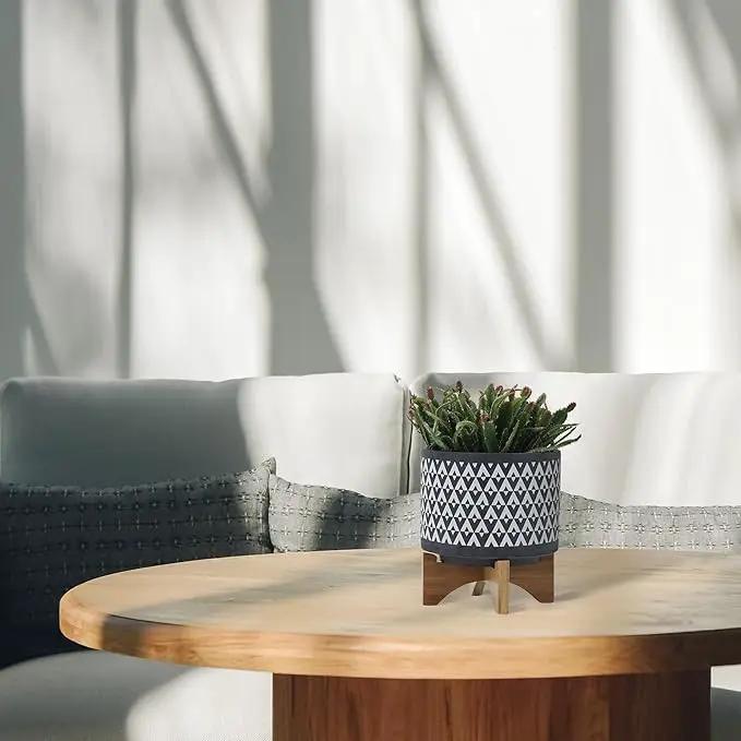 Sagebook Home 9" H 8" Diameter Dark Gray and Ivory Aztec Design Ceramic Planter with Solid Rubberwood Stand for Living Room, Bedroom, or Office by GreenHaven Gardens