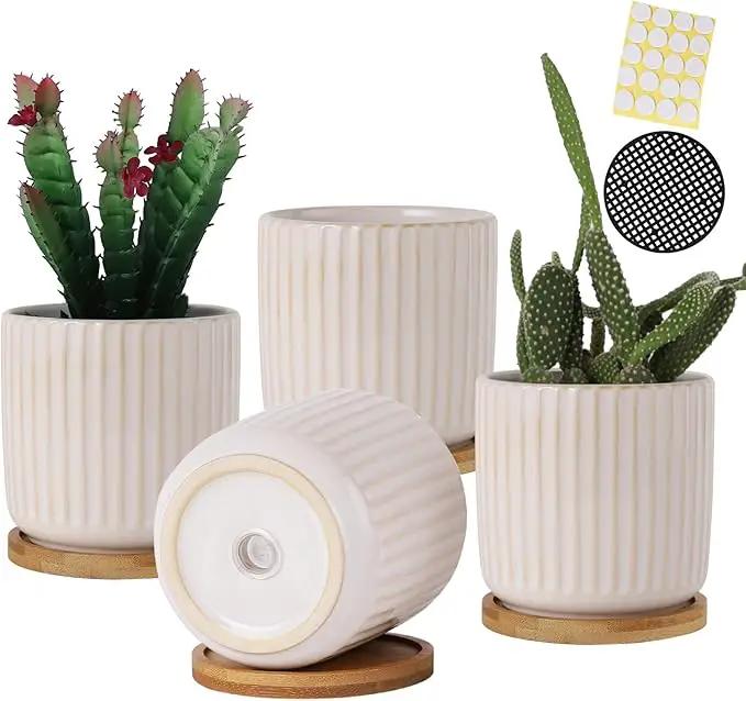 OMAYKEY 4 Inch Ceramic Plant Pot with Saucer, Creative Stripe Small Planters Pots with Drainage Hole and Mesh Pads for Succulent, Cactus, Herbs, White - Set of 4 by GreenHaven Gardens