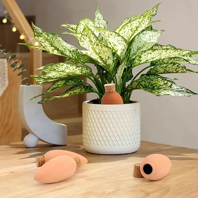 4 Pack Olla Watering Pot, Self Watering Globes 5.2oz Slow Release Terracotta Watering Spikes for Indoor Outdoor Plants, Easy to Refill Automatic Dripping Clay Bulbs Planter Insert (4.9" Tall, Cone) by GreenHaven Gardens