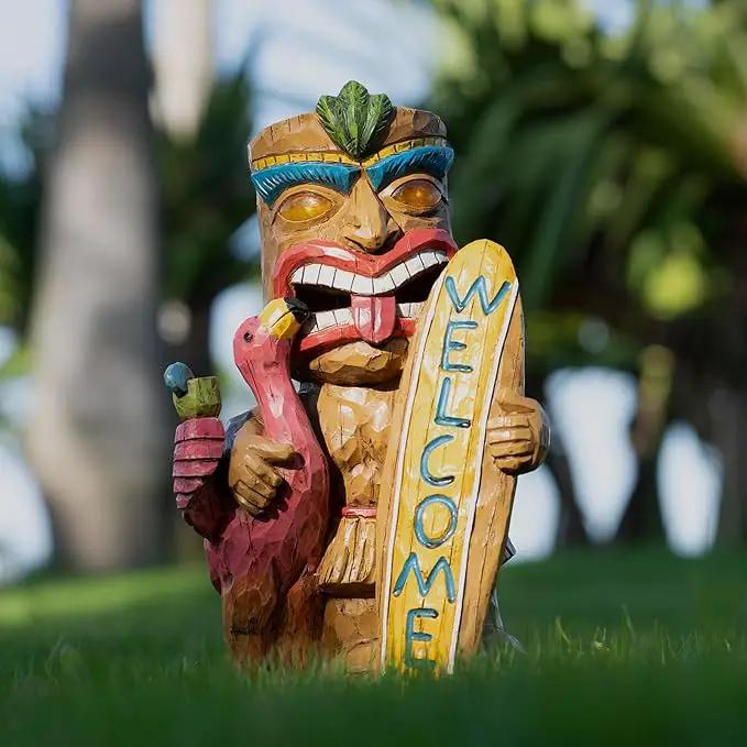Welcome Tiki Statue with Surfboard Flamingo-Solar Outdoor Decor - Tiki Man with Automatic Switch On Flickering Eyes LED Light for Tiki Bar Decorations, Patio, Balcony, Yard,Lawn,Gifts by GreenHaven Gardens