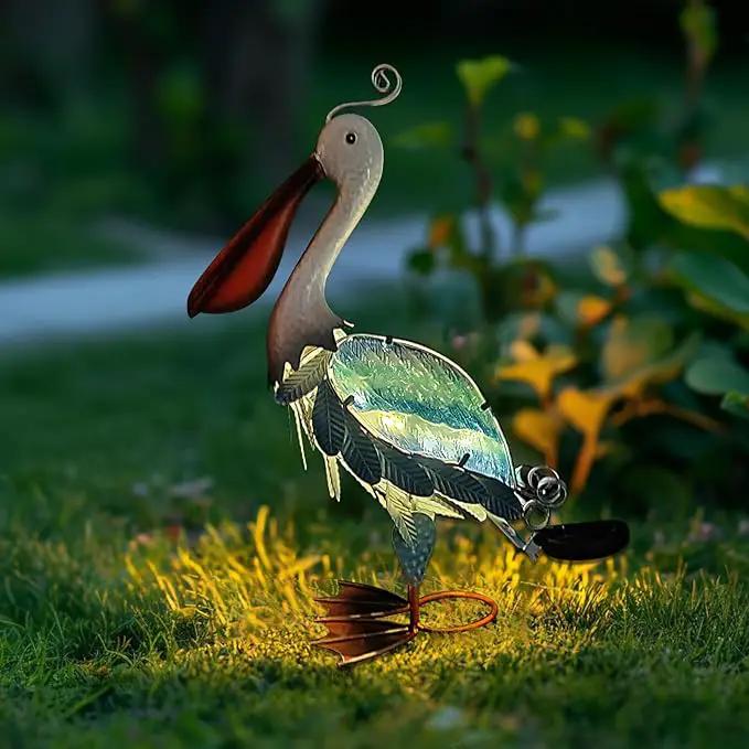 HONGLAND Solar Metal Pelican Statues Garden Sculpture & Statues, 19 Inch Glass Outdoor Pelican Yard Art Coastal Ocean Bird Decor Lawn Ornament for Backyard Porch Patio Decor（Blue） by GreenHaven Gardens