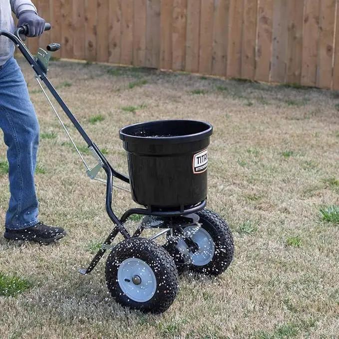 Titan Attachments 50 lb Professional Fertilizer Push Broadcast Spreader, Spreads 10 to 12 FT, Lawn Care and Ice Melter, Yard Tool by GreenHaven Gardens