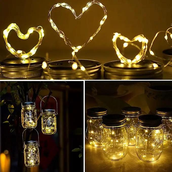 Solar Mason Jar Lid Lights 12 Pack 30 LED Firefly Fairy String Lights, Waterproof Outdoor Solar Lights with Hangers for Regular Mouth Jars (No Jars Included) by GreenHaven Gardens