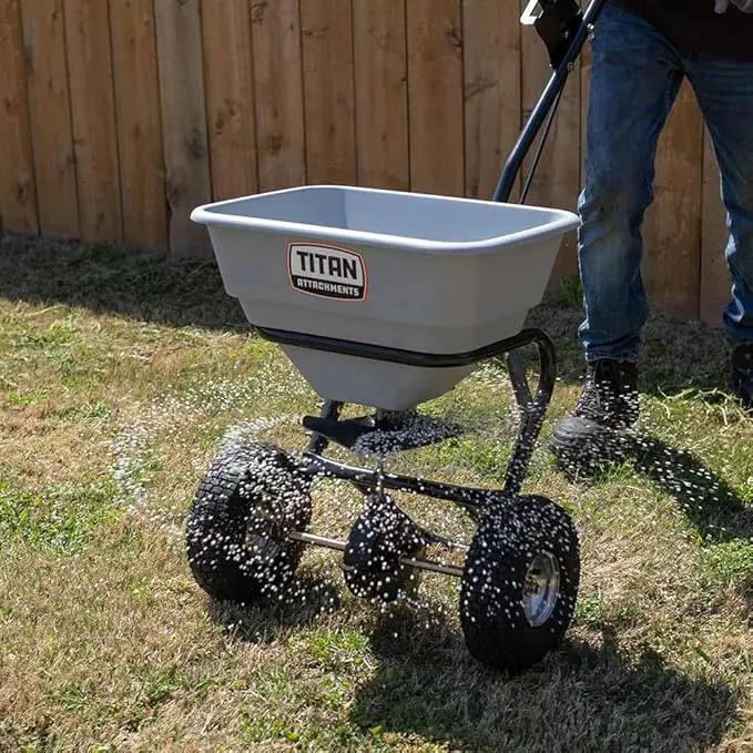 Titan Attachments 70 LB Professional Fertilizer Push Broadcast Spreader, Spreads 10 to 12 FT, Lawn Care and Ice Melter, Yard Tool by GreenHaven Gardens
