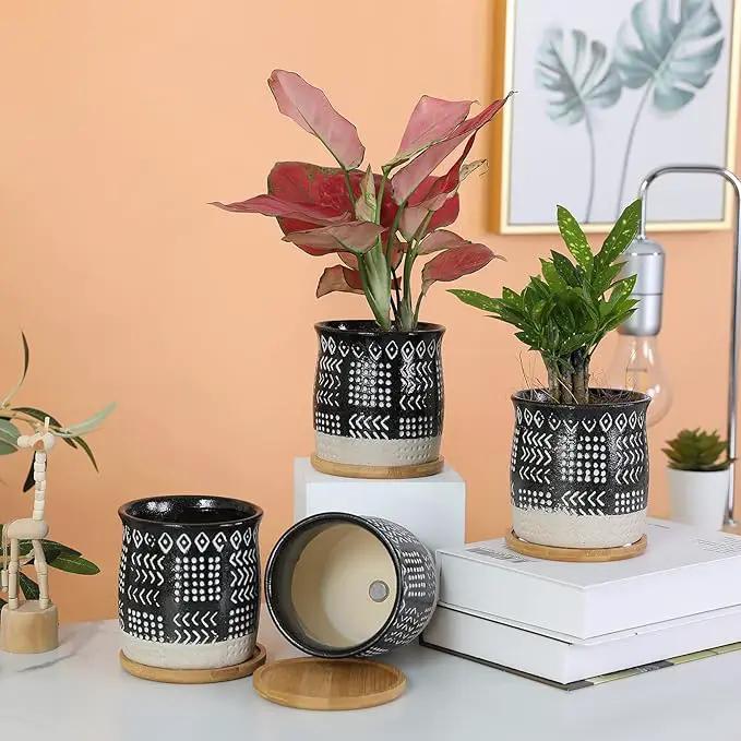 OMAYKEY 4 Inch Ceramic Plant Pot with Tray, Retro Black Small Planters Pots with Drainage Hole & Mesh Pads for Succulent, Indoor Flowers, Snake Plants, Cactus, Herbs, Aloes - 4 Packs by GreenHaven Gardens