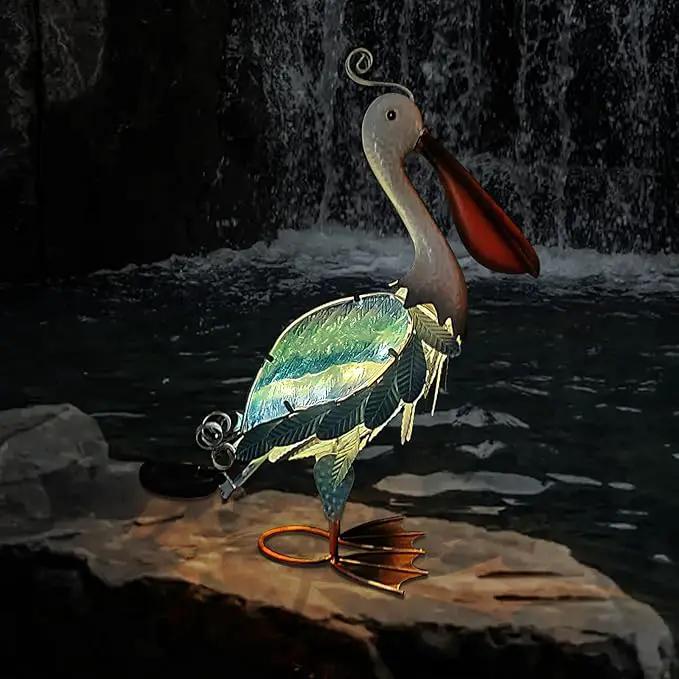 HONGLAND Solar Metal Pelican Statues Garden Sculpture & Statues, 19 Inch Glass Outdoor Pelican Yard Art Coastal Ocean Bird Decor Lawn Ornament for Backyard Porch Patio Decor（Blue） by GreenHaven Gardens