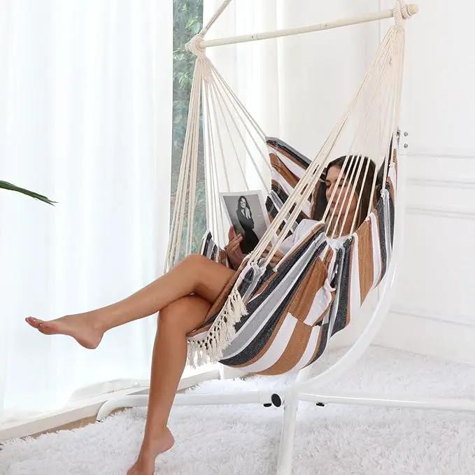 Chihee Hammock Chair Hanging Chair with Foot Rest 2 Cushions Max 500lbs Robust Metal Spreader Bar Collapsible Easy Storage Soft Cotton Swing Chair Strong Strap Iron Carabiner Side Pocket Included by GreenHaven Gardens