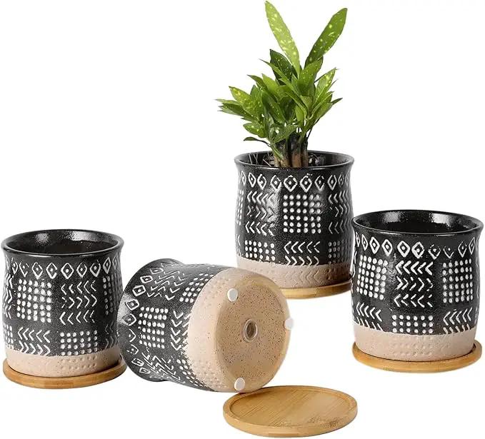 OMAYKEY 4 Inch Ceramic Plant Pot with Tray, Retro Black Small Planters Pots with Drainage Hole & Mesh Pads for Succulent, Indoor Flowers, Snake Plants, Cactus, Herbs, Aloes - 4 Packs by GreenHaven Gardens