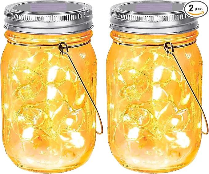 SteadyDoggie Solar Mason Jar Lights - Set of 2 Magical Patio Lights in Glass Lanterns - Hang Them Anywhere Outdoors for Enchanting Illumination - Waterproof and Decorative - 5.2" x 3" by GreenHaven Gardens