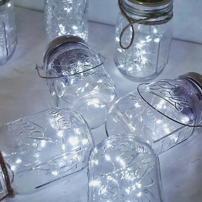 Decorman Solar Mason Jar Lights, 4 Pack 30 LED Fairy Star Firefly String Lids Lights with 4 Hangers for Patio Yard Garden Party Wedding Christmas Decoration(Jars Not Included) (4 Pack, Cool White) by GreenHaven Gardens
