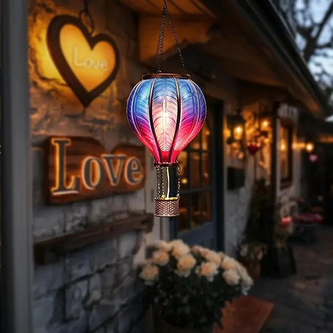 TERESA'S COLLECTIONS Hot Air Balloon Solar Lantern for Garden Decor Halloween Christmas Party,Flickering Flame Hanging Solar Light for Outdoor ,Blue & Purple Plastic Lamp for Yard Tree,Gift for Mom by GreenHaven Gardens