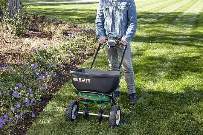 Scotts Elite Spreader for Grass Seed, Weed and Feed, Fertilizer, Salt and Ice Melt, Durable Push Spreader Holds up to 20,000 sq. ft Product by GreenHaven Gardens