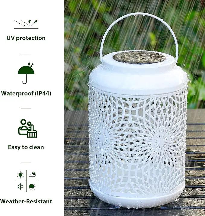 Glitzhome Solar Lantern White Metal Cutout Scrollwork Outdoor Hanging Solar Light with Handle for Garden Patio Yard Outdoor Decor by GreenHaven Gardens