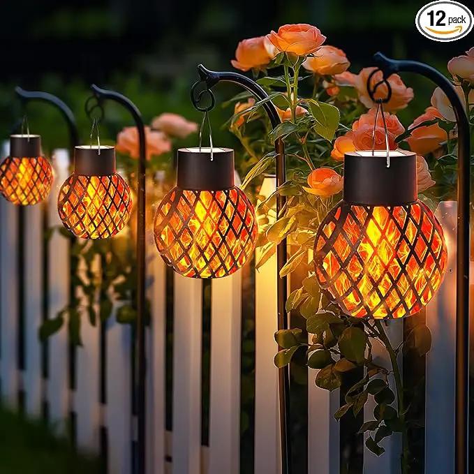 GIGALUMI Solar Lights Outdoor Waterproof,12 Pack Solar Hanging Lights with Flickering Flame,Outdoor Solar Lights for Yard,Patio,Tree,Camping,Christmas Decoration,New Upgraded Larger Lanterns by GreenHaven Gardens