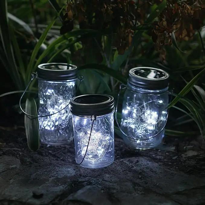 Decorman Solar Mason Jar Lights, 12 Pack 30 LED Fairy Star Firefly String Lids Lights with 12 Hangers for Patio Yard Garden Party Wedding Christmas Decoration(Jars Not Included) (12 Pack, Cool White) by GreenHaven Gardens