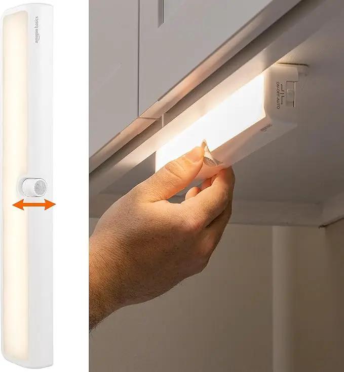 Amazon Basics LED USB/Battery Operated Light Bar, Swivel Motion Sensor, Stick on Lights, 250 Lumens, 12 Inches, Under Cabinet Lighting, Closet, Kitchen, 2 Pack, White by GreenHaven Gardens