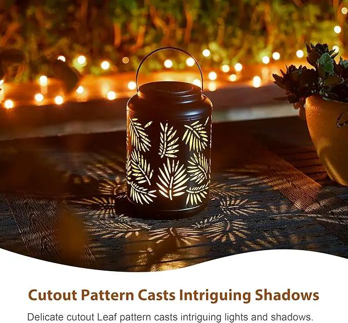 Glitzhome Solar Lantern Black Metal Cutout Leaf Outdoor Hanging Solar Light with Handle for Garden Patio Yard Outdoor Decor by GreenHaven Gardens