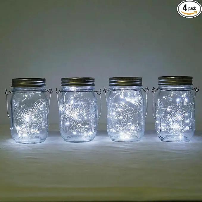 Decorman Solar Mason Jar Lights, 4 Pack 30 LED Fairy Star Firefly String Lids Lights with 4 Hangers for Patio Yard Garden Party Wedding Christmas Decoration(Jars Not Included) (4 Pack, Cool White) by GreenHaven Gardens