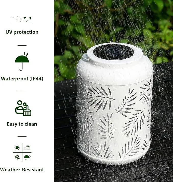 Glitzhome Solar Lantern White Metal Cutout Leaf Outdoor Hanging Solar Light with Handle for Garden Patio Yard Outdoor Decor by GreenHaven Gardens