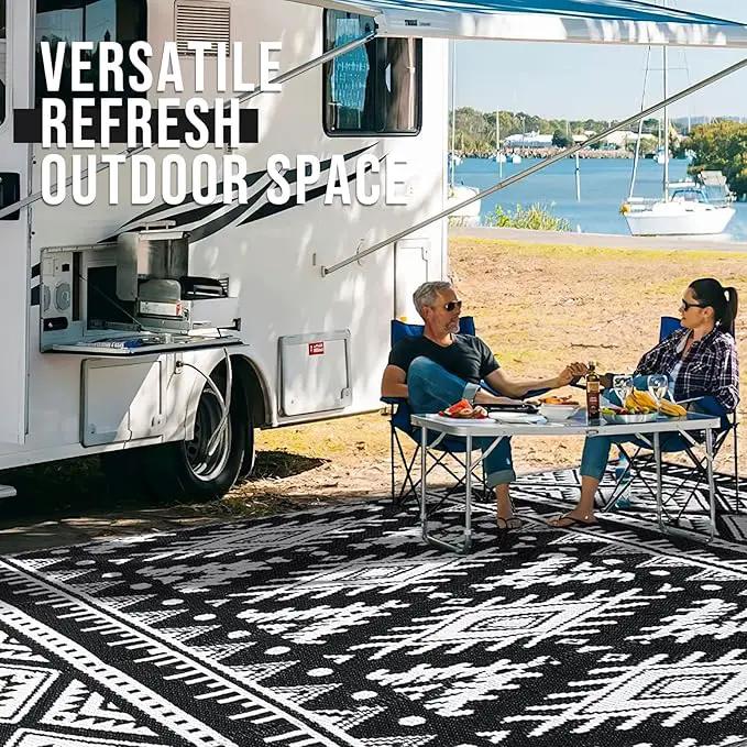 OLANLY Outdoor Rug Waterproof 10x14 ft, Reversible Outdoor Plastic Straw Rug, Boho Patio Rug, Indoor Outdoor Carpet, RV Mat Outside for Patio, Camp, Picnic, Balcony, Deck, Backyard, Black & White by GreenHaven Gardens