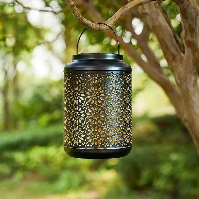 Glitzhome Solar Lantern Black Metal Cutout Flower Outdoor Hanging Solar Light with Handle for Garden Patio Yard Outdoor Decor by GreenHaven Gardens