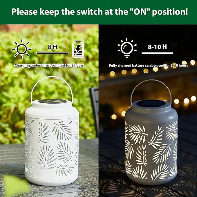 Glitzhome Solar Lantern White Metal Cutout Leaf Outdoor Hanging Solar Light with Handle for Garden Patio Yard Outdoor Decor by GreenHaven Gardens