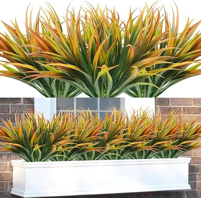 16Pcs Artificial Grass Fake Plants 17.3in Outdoor Plastic Plants UV Resistant Greenery Fake Grass for Home Window Garden Office Patio Hanging Planter Pathway Front Porch Décor Orange Yellow by GreenHaven Gardens