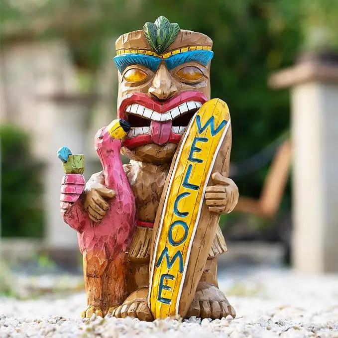 Welcome Tiki Statue with Surfboard Flamingo-Solar Outdoor Decor - Tiki Man with Automatic Switch On Flickering Eyes LED Light for Tiki Bar Decorations, Patio, Balcony, Yard,Lawn,Gifts by GreenHaven Gardens