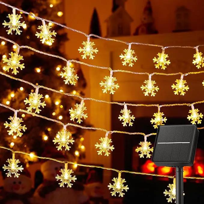Brightown Solar Christmas Snowflake String Lights 50 LED 31 FT Outdoor Waterproof Snowflake Fairy Lights with 8 Lighting Modes for Christmas Party, Tree, Room, Garden, Patio, Yard, Home, Warm White by GreenHaven Gardens