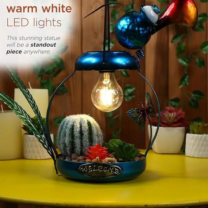 Alpine Corporation LYT290SLR-HH Solar-Powered Metal Flamingo with Garden Enclosed LED Light, Solar Patio Decor, 16''H, Blue by GreenHaven Gardens