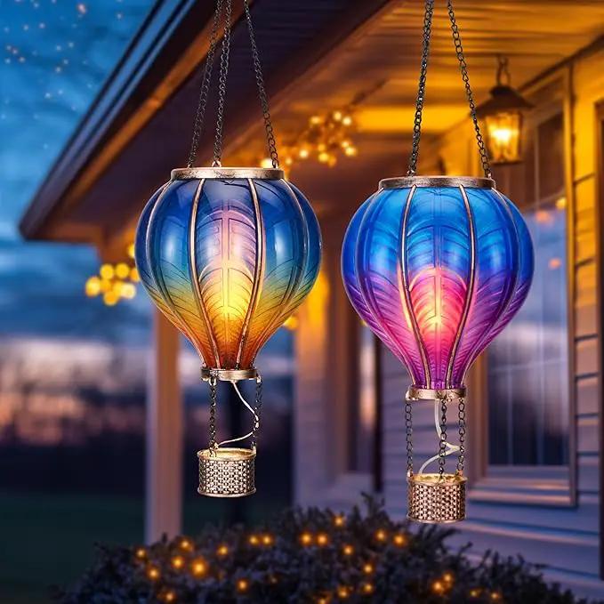 TERESA'S COLLECTIONS 2 Pack Hanging Solar Lantern Outdoor Garden Decor for Valentine,Waterproof Plastic Hot Air Balloon Blue Flickering Flame Effect Lantern for Yard Tree,Gift for Mom,18" by GreenHaven Gardens