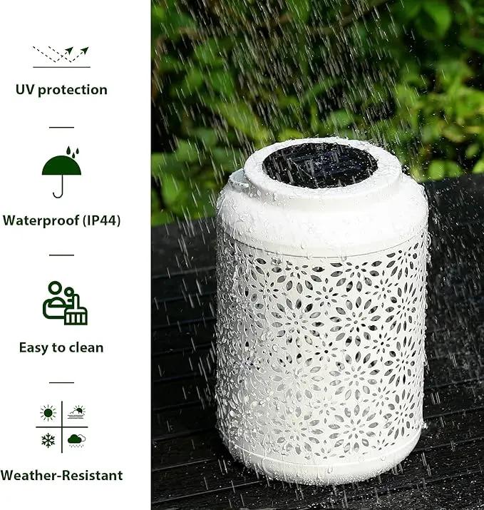 Glitzhome Solar Lantern White Metal Cutout Flower Outdoor Hanging Solar Light with Handle for Garden Patio Yard Outdoor Decor by GreenHaven Gardens