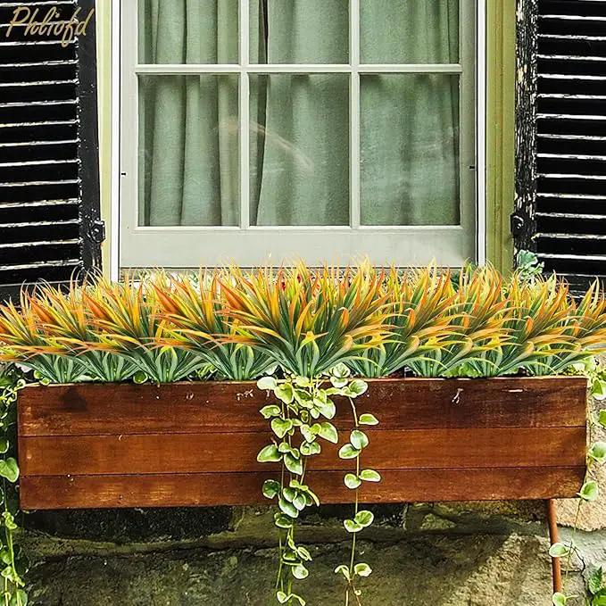16Pcs Artificial Grass Fake Plants 17.3in Outdoor Plastic Plants UV Resistant Greenery Fake Grass for Home Window Garden Office Patio Hanging Planter Pathway Front Porch Décor Orange Yellow by GreenHaven Gardens