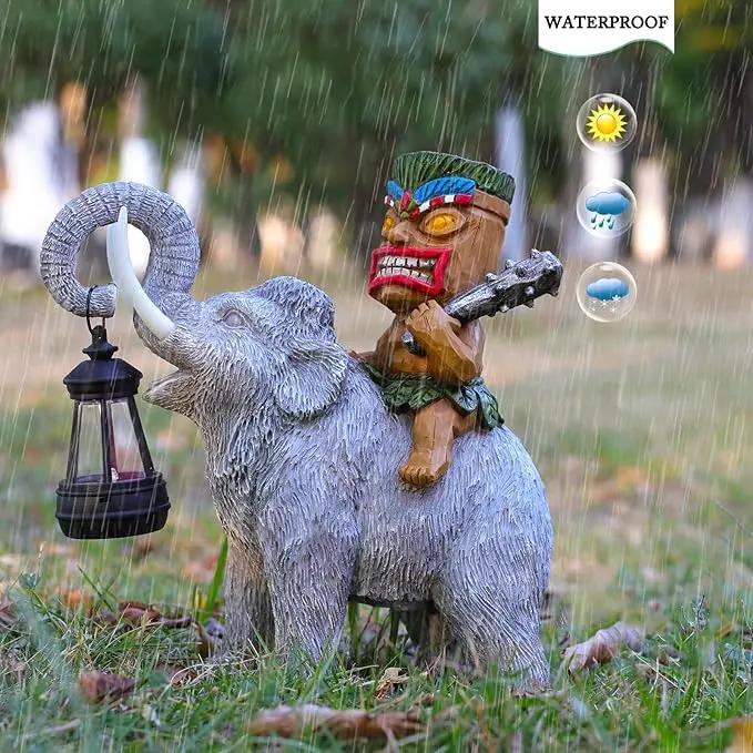 Solar Tiki Statue-Outdoor Statues-Tiki Bar Decor-Solar Powered Light Garden Figurine Tiki Decoration for Bar,Patio,Balcony,Yard,Lawn,Table,Riding A Elephant 9.09 Inches Tall by GreenHaven Gardens