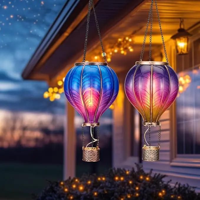 TERESA'S COLLECTIONS 2 Pack Hanging Solar Lantern Outdoor Garden Decor for Valentine ,Waterproof Plastic Hot Air Balloon Purple Flickering Flame Effect Lantern for Yard Tree Gift for Mom,18" by GreenHaven Gardens