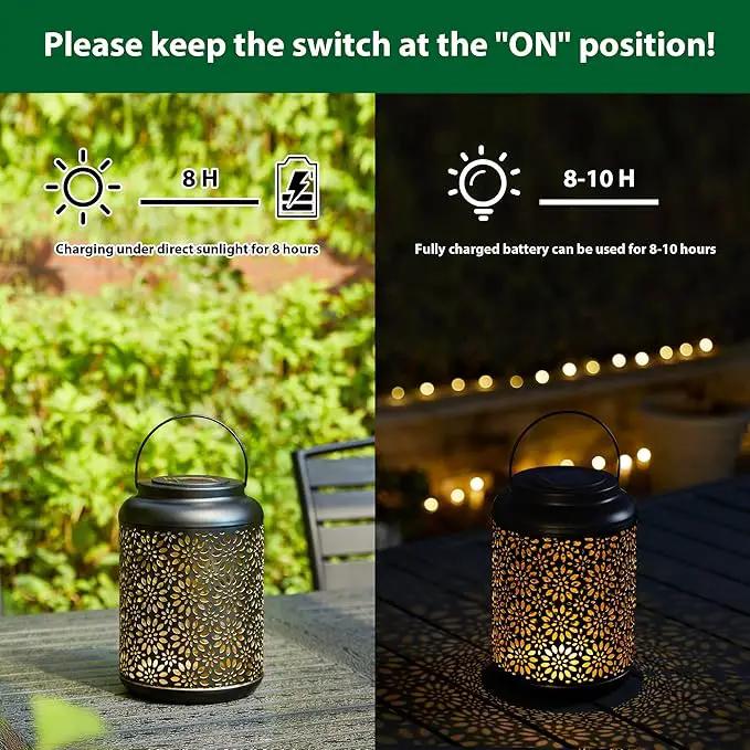 Glitzhome Solar Lantern Black Metal Cutout Flower Outdoor Hanging Solar Light with Handle for Garden Patio Yard Outdoor Decor by GreenHaven Gardens