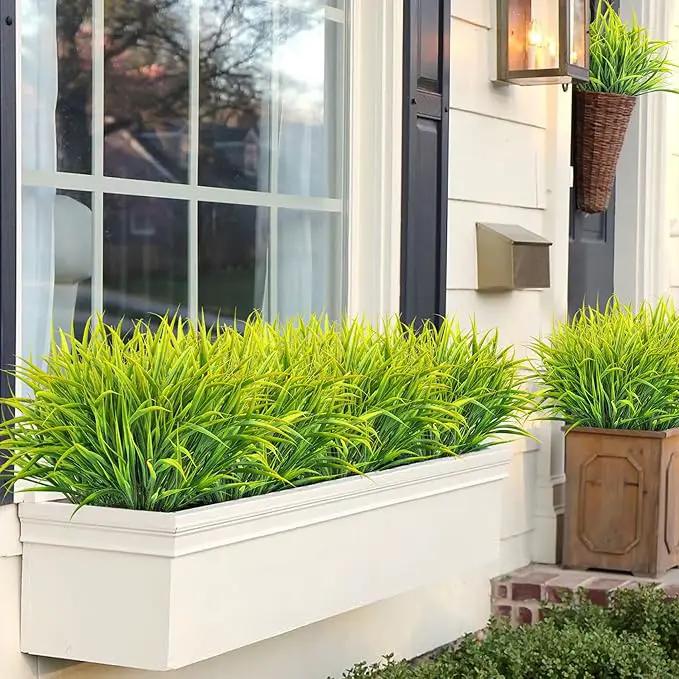 Ouddy Decor 16 Bundles Artificial Plants Outdoor Fake Grass Greenery Stems UV Resistant Faux Plastic Plants Shrubs for Spring Summer Home Garden Pathway Window Box Front Porch Decor, Yellow by GreenHaven Gardens