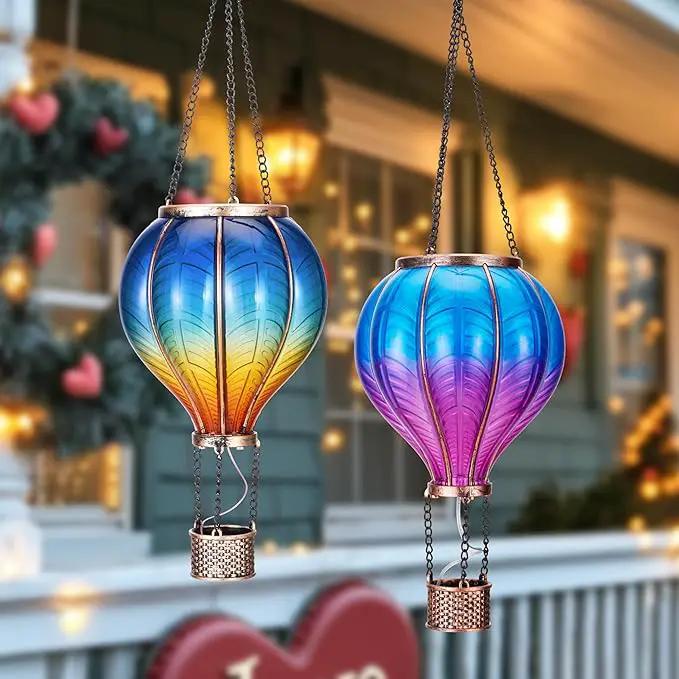 TERESA'S COLLECTIONS 2 Pack Hanging Solar Lantern Outdoor Garden Decor for Valentine,Waterproof Plastic Hot Air Balloon Blue Flickering Flame Effect Lantern for Yard Tree,Gift for Mom,18" by GreenHaven Gardens