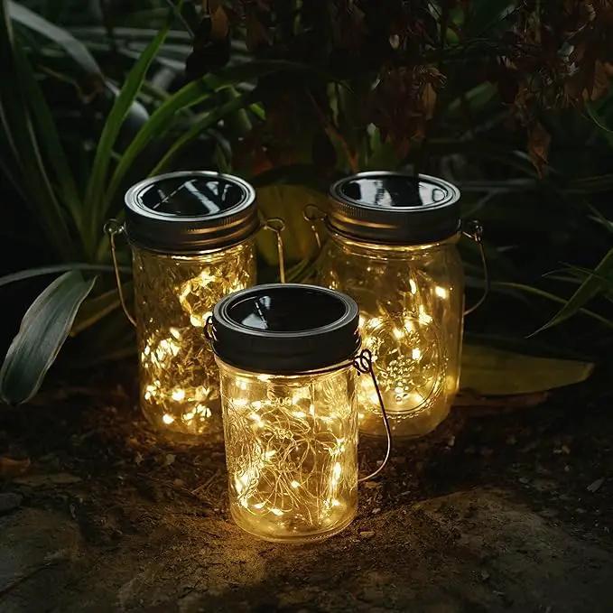 Decorman Solar Mason Jar Lights, 4 Pack 30 LED Fairy Star Firefly String Lids Lights with 4 Hangers for Patio Yard Garden Party Wedding Christmas Decoration(Jars Not Included) (4 Pack, Warm White) by GreenHaven Gardens