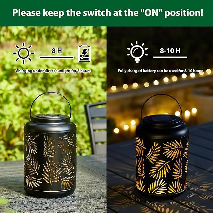 Glitzhome Solar Lantern Black Metal Cutout Leaf Outdoor Hanging Solar Light with Handle for Garden Patio Yard Outdoor Decor by GreenHaven Gardens