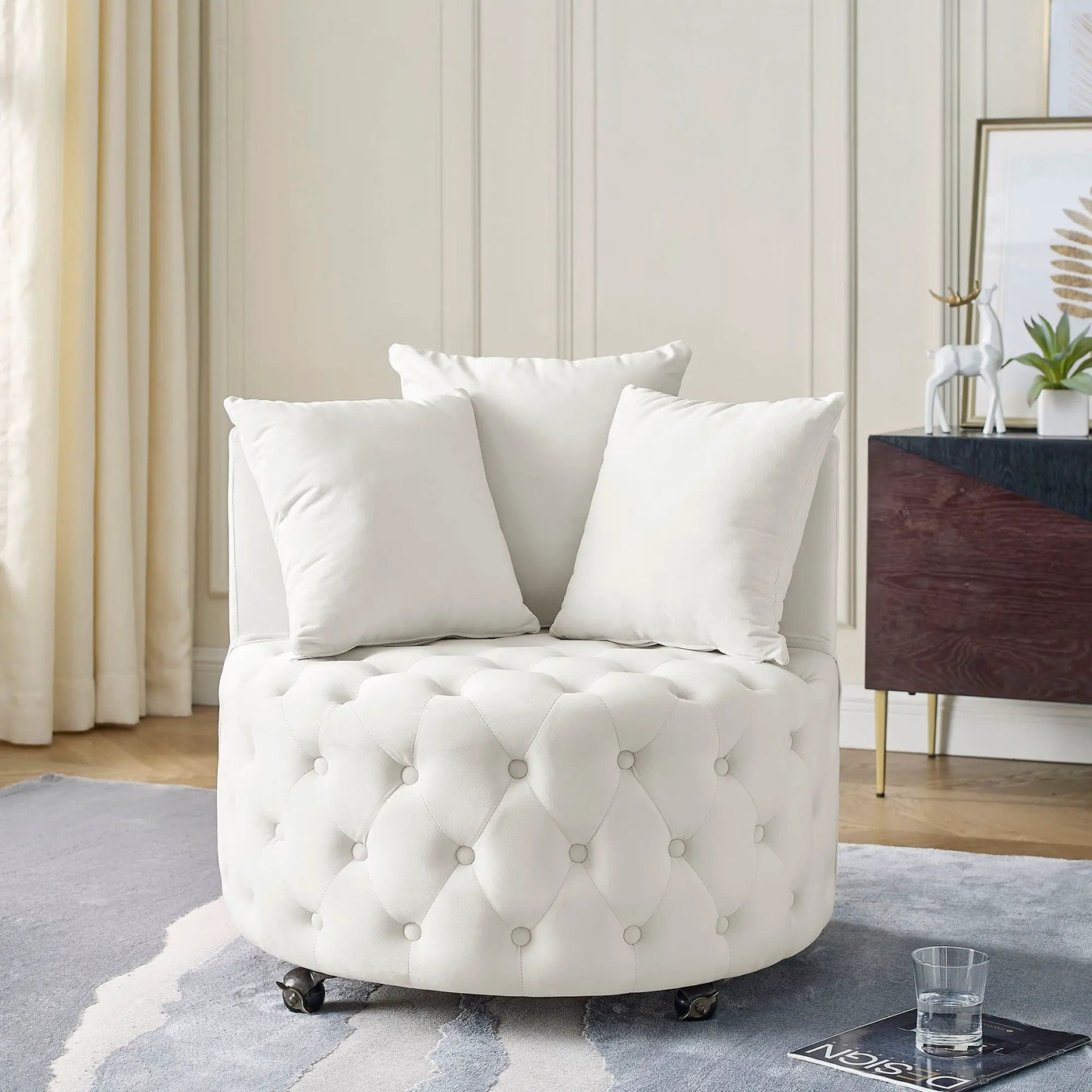 Modern Upholstered Swivel Chair With Button Tufted Design And Movable Wheels by HouseOfZazla